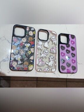Casetify iPhone 13 Pro Max set of 3 peanuts, aristocats Marie, Twice hearts